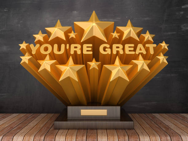 istock Gold Stars with YOU'RE GREAT Phrase on Trophy - Chalkboard Background - 3D Rendering 1185838681
