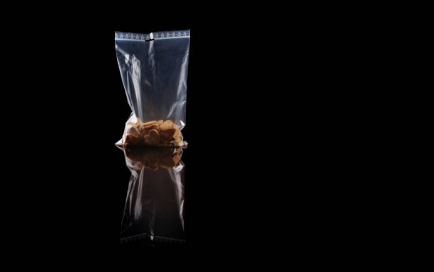 istock sweets in plastic food packaging with reflection and copy space 1185839802