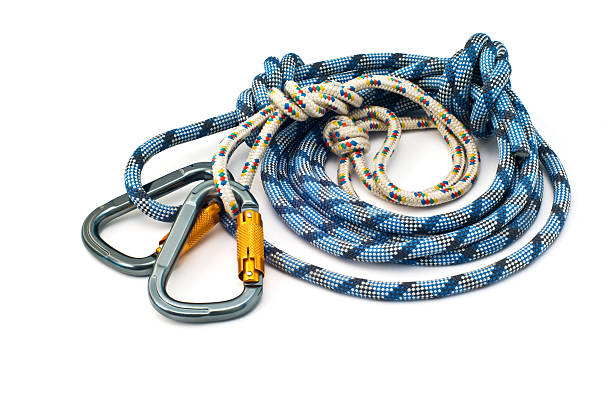 istock climbing equipment - carabiners and rope 118584102