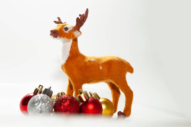 istock Festive christmas background with presents and reindeer 1185842255