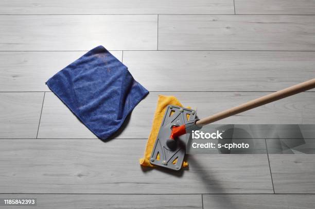 Cleaning Equipments On The Parquet Flooring Stock Photo - Download Image Now - Chores, Clean, Cleaning