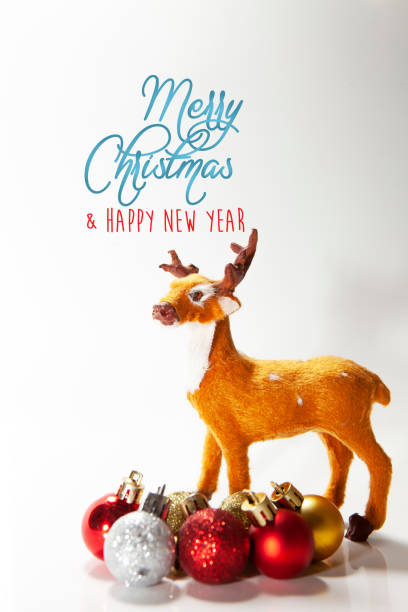 istock Festive christmas background with presents and reindeer 1185842481
