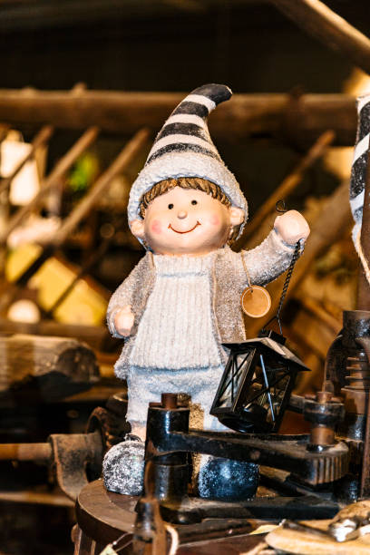 istock Gnome doll on winter clothes with lamp in hand 1185844206