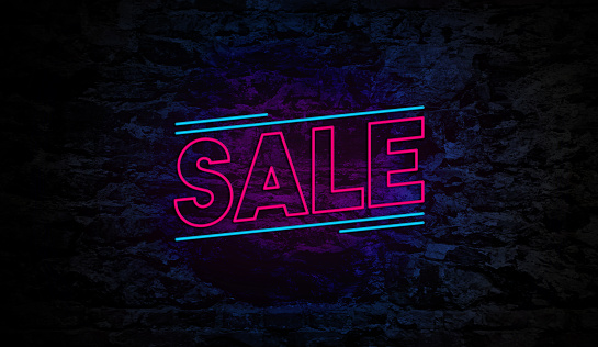Sale Neon Sign on Brick Wall Background