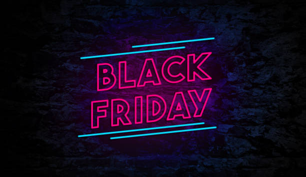 Black Friday Neon Sign on Brick Wall Background