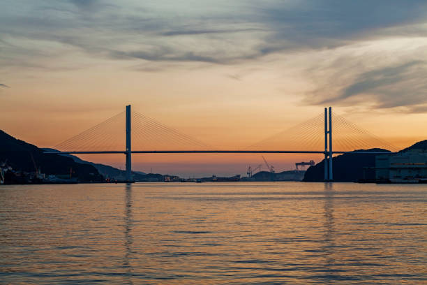 View of Megami Ohashi bridge in Nagasaki harbour. stock photo