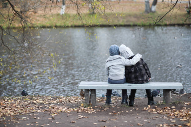 istock Children walk in the autumn park 1185849746