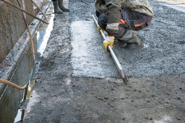 istock builders poured concrete at the construction site 1185852477