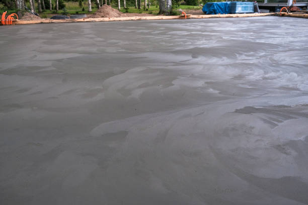 istock builders poured concrete at the construction site 1185852529