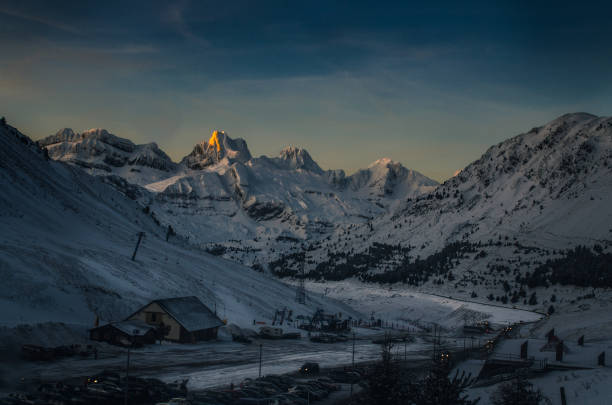 istock Aspe peak bathed in orange sun light just before sunset in Astun, Spain 1185852588