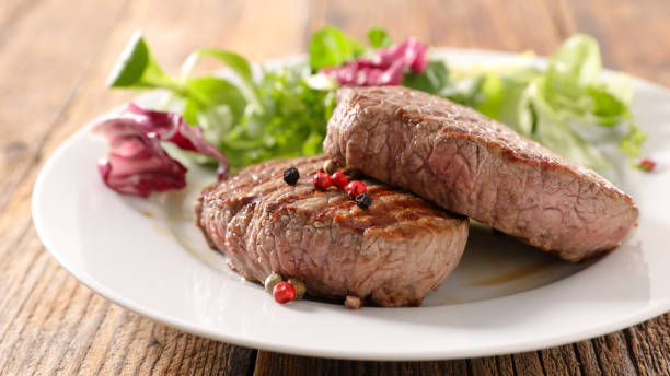 istock grilled beef steak and salad 1185854068