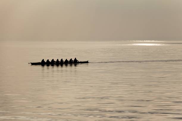 istock Canoeing team teamwork at water sports challenge competition 1185855253