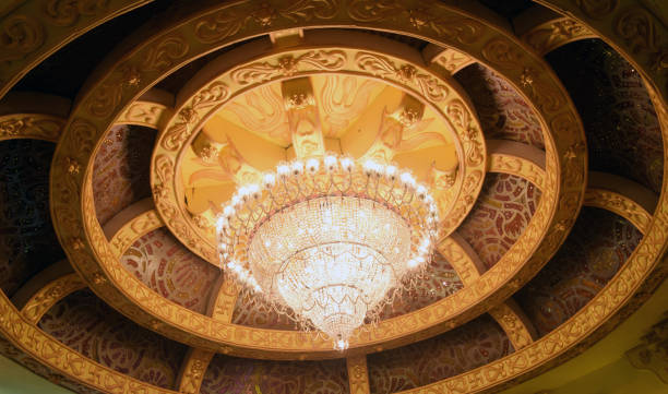 istock A round shaped chandelier hanging from ceiling and view directly from below 1185855927