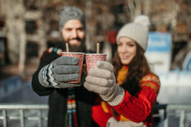 istock Couple getting ready to ice skate 1185858722