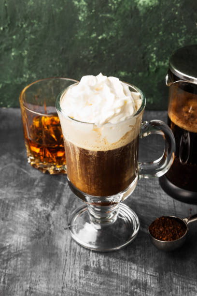 istock Irish coffee with whisky on dark background 1185858985