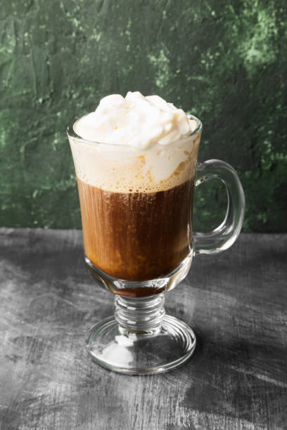 istock Irish coffee with whisky on dark background 1185859004