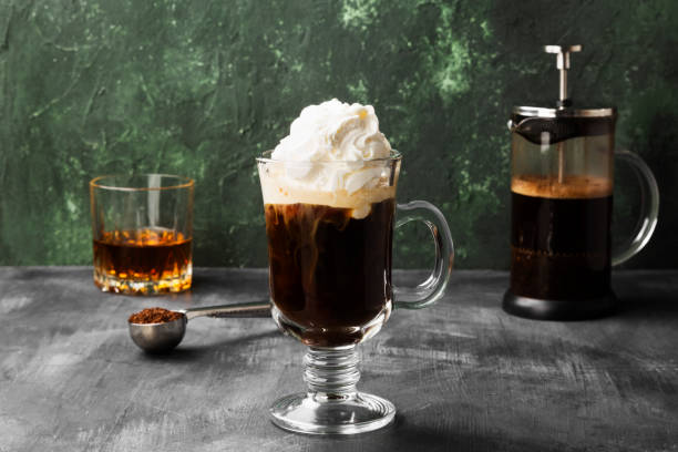 istock Irish coffee with whisky on dark background 1185859017