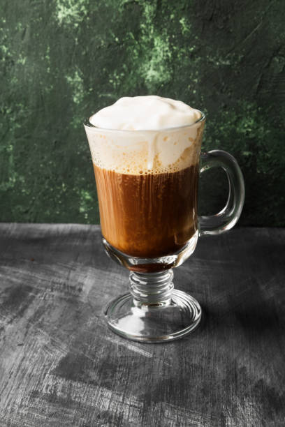istock Irish coffee with whisky on dark background 1185859018