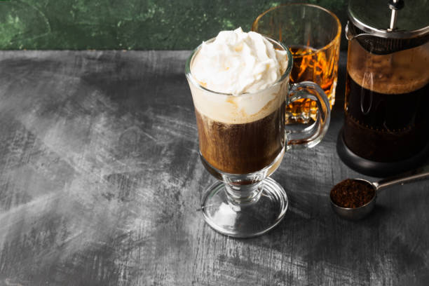 istock Irish coffee with whisky on dark background. Copy space. Food background 1185859032