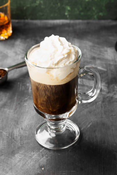 istock Irish coffee with whisky on dark background 1185859068