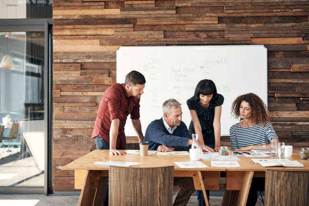 istock Working through their plans in detail 1185859169