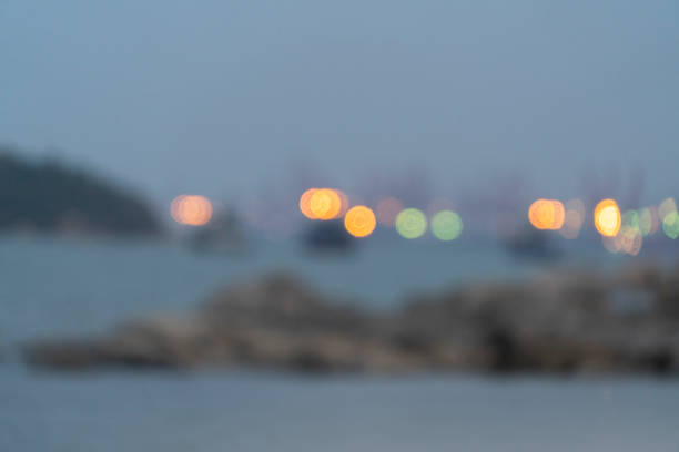 lens flare: harbor and island at dusk