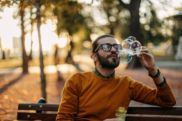 Man with bubble wand