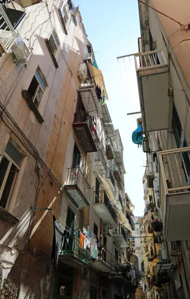 high houses on the narrow street in Naples City in Italy in the popular neighborhood called Quartieri Spagnoli