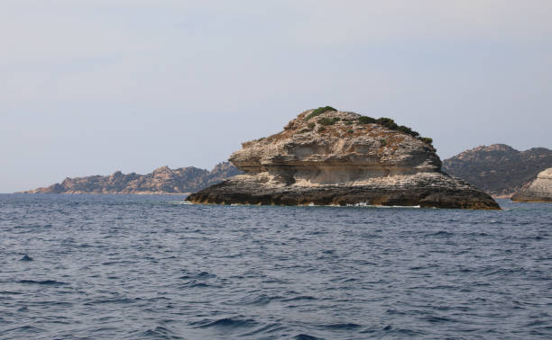istock rocks on the mediterranean sea 1185862646