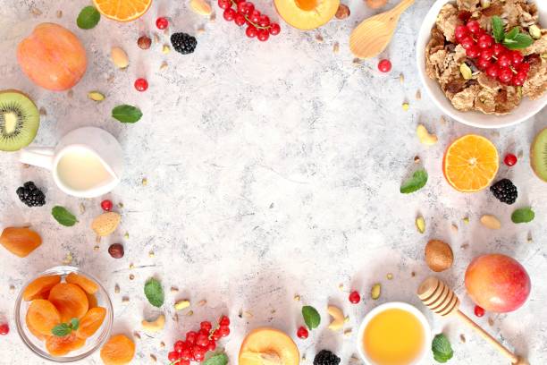 istock Healthy breakfast ingredients on light background. 1185862817