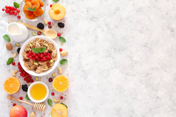 istock Healthy breakfast ingredients on light background. 1185862820
