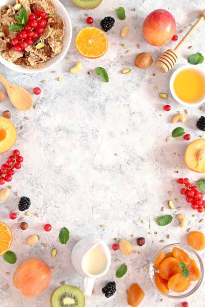 istock Healthy breakfast ingredients on light background. 1185862827