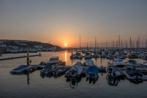 istock A Beautiful Sunset over Brixham Harbour 1185863257