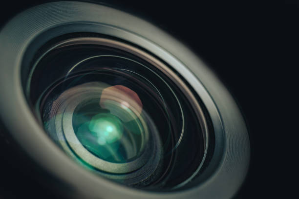 istock Close up beautiful camera lens on a black background. Macro view. 1185863405