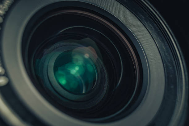 istock Close up beautiful camera lens on a black background. Macro view. 1185863483