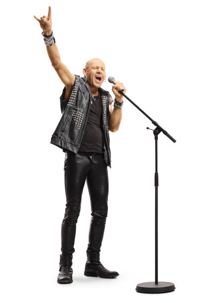istock Male rock star singing on a microphone 1185864714