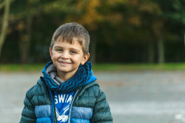 Cute blonde child looking at the camera