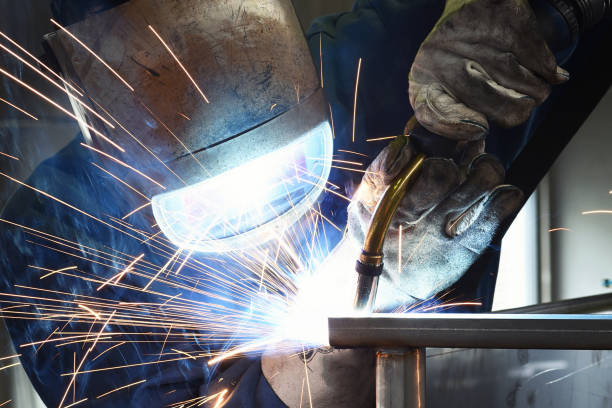 istock welder works in metal construction - construction and processing of steel components 1185871291