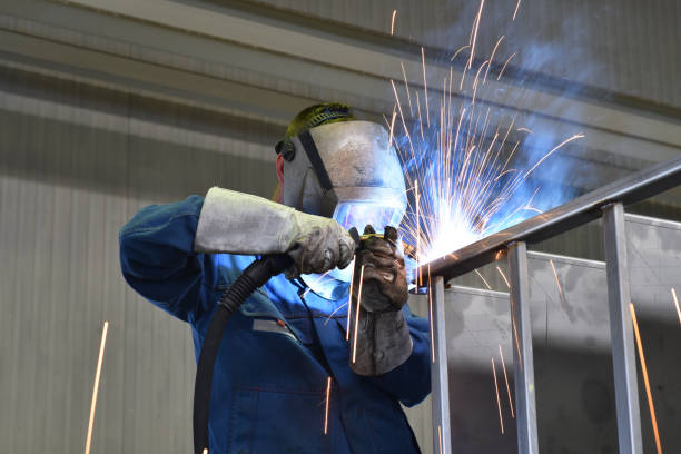istock welder works in metal construction - construction and processing of steel components 1185871473