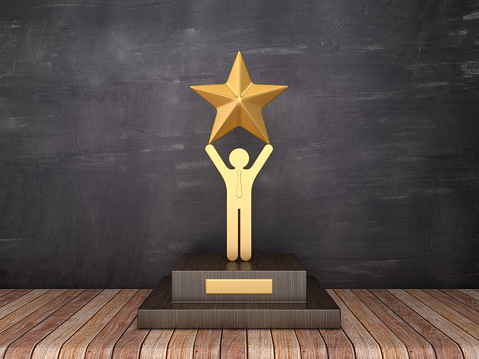 Trophy with Business Pictogram with Star on Wood Floor - Chalkboard Background - 3D Rendering