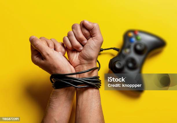 Wired Hands With Joypad Stock Photo - Download Image Now - Addiction, Gaming Disorder, Hand