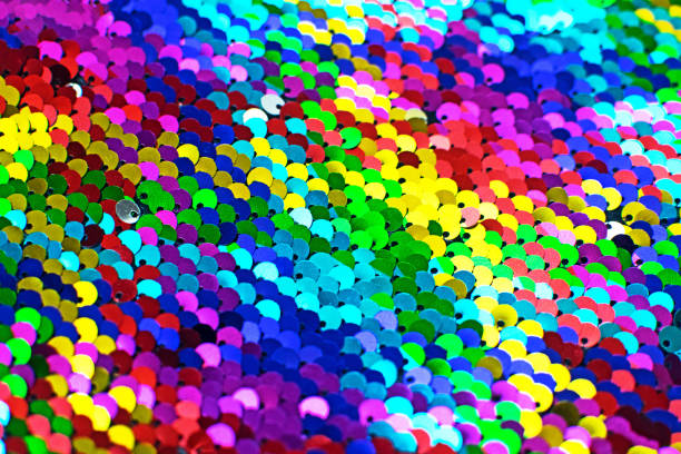 istock Pieces of cloth with multi-colored sequins. Glitter background. Sequin texture. 1185873232