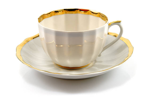 xícara e pires com debruns dourados - tea cup cup old fashioned china imagens e fotografias de stock