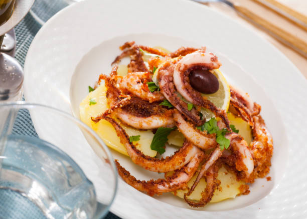 istock Fried shrimps served with lemon and parsley 1185876412