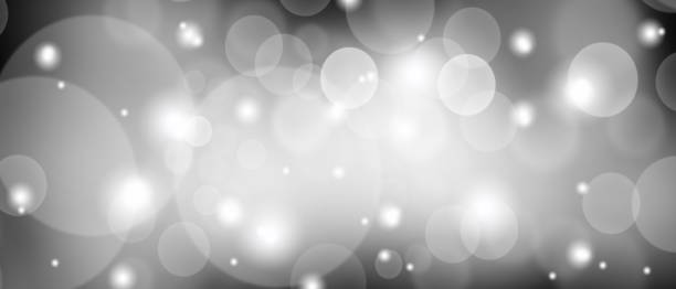 istock Black abstract texture background with white bokeh blurred shiny lights use wallpaper backdrop and your product. 1185876783
