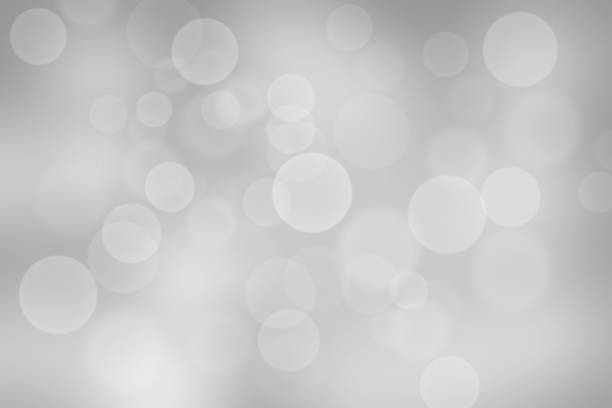 istock Gray abstract texture background with white bokeh light Christmas new year snowflake blurred beautiful shiny lights use wallpaper backdrop and your product. 1185877576