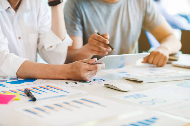 istock Business Corporate team brainstorming with chart and checking and analysis 1185879338