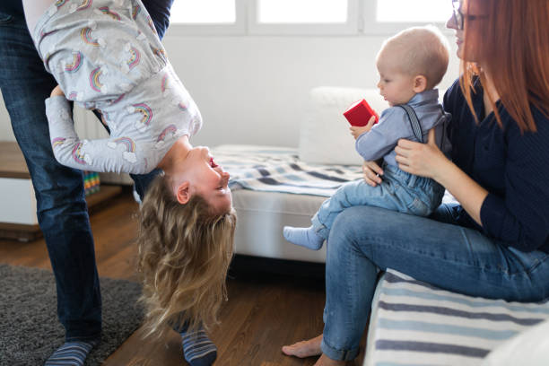 istock Whole family have fun at home 1185882254