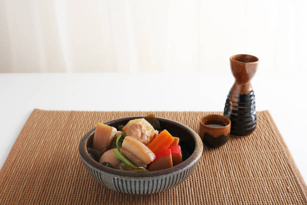 istock Delicious Japanese casserole and sake 1185884594