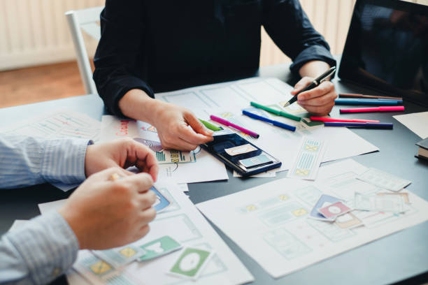 istock Mobile application designers plan together in the office. 1185887298